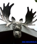 Elk bull head silhouette arched, hammered through with a ball hammer, mounted at gable detailwidth 70 cm.
