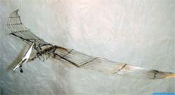 Flight-saurian mobiles wire sculpture.