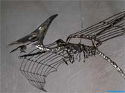 Flight-saurian mobiles wire sculpture.