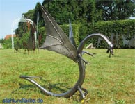 Garden Sculpture dragon from welded and forged sheet steel.