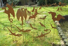 Garden stakes metal-sheet rusty bat.