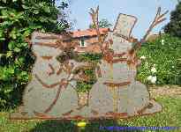 Garden stakes metal sheet rusty snowman gangster.