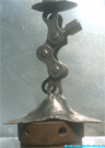 Steel sculpture: Long-chaincandle stick "Atlas".