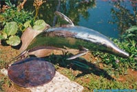 Swinging sculpture dolphin.